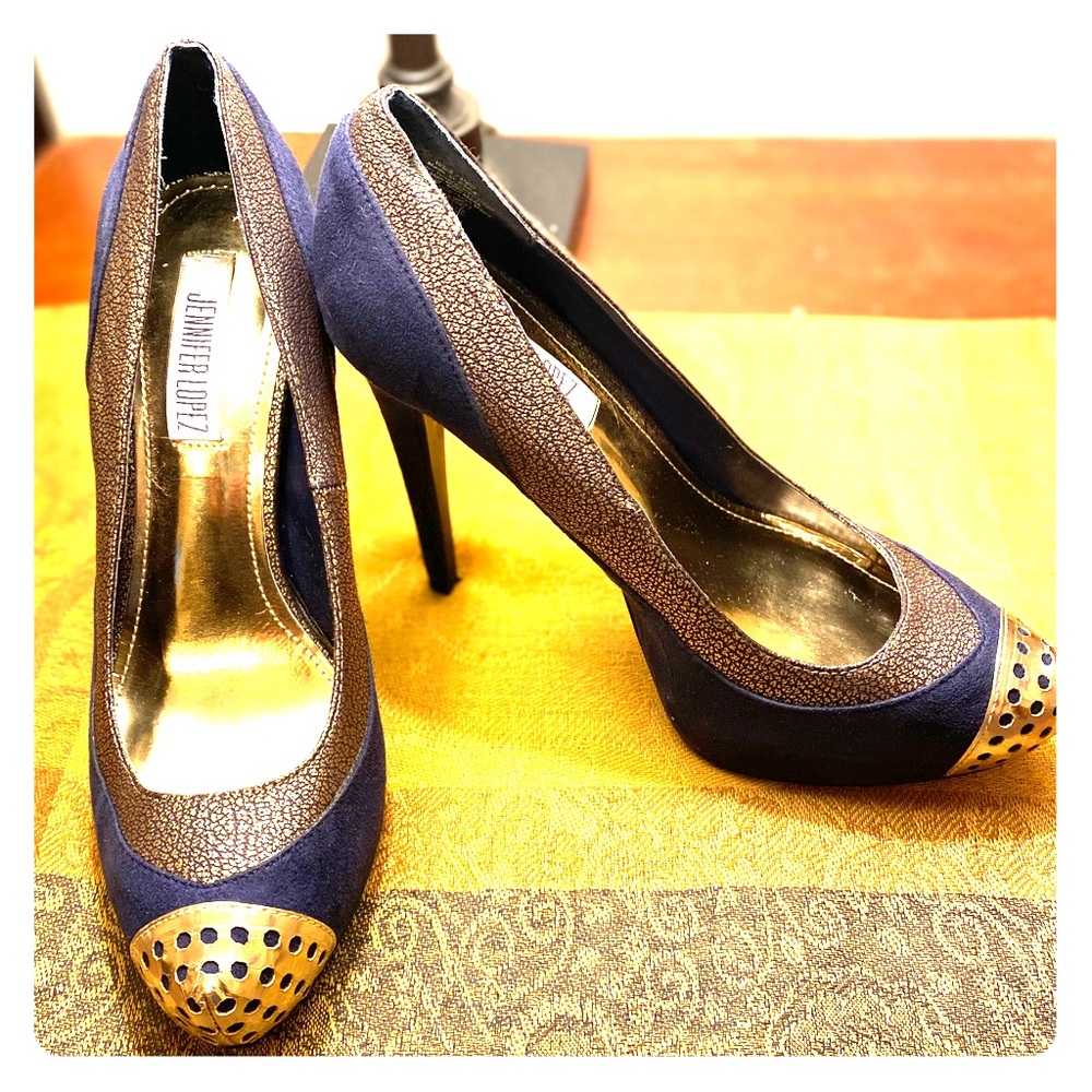 Navy blue heels with gold accent
